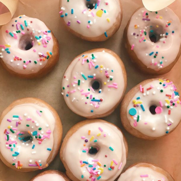 Vanilla Donuts with Strawberry Glaze and Confetti Sprinkles